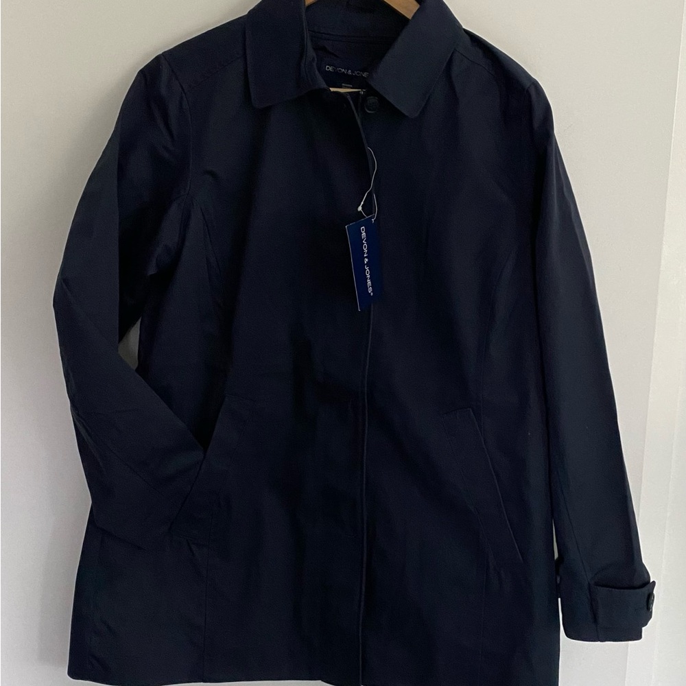 Navy Blue hip- length spring jacket.